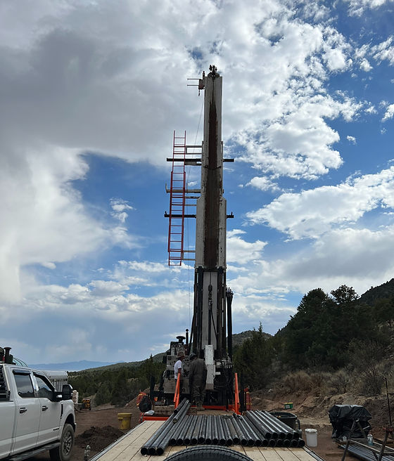 Gorilla Drillers core rig masted up on a Nevada ridge